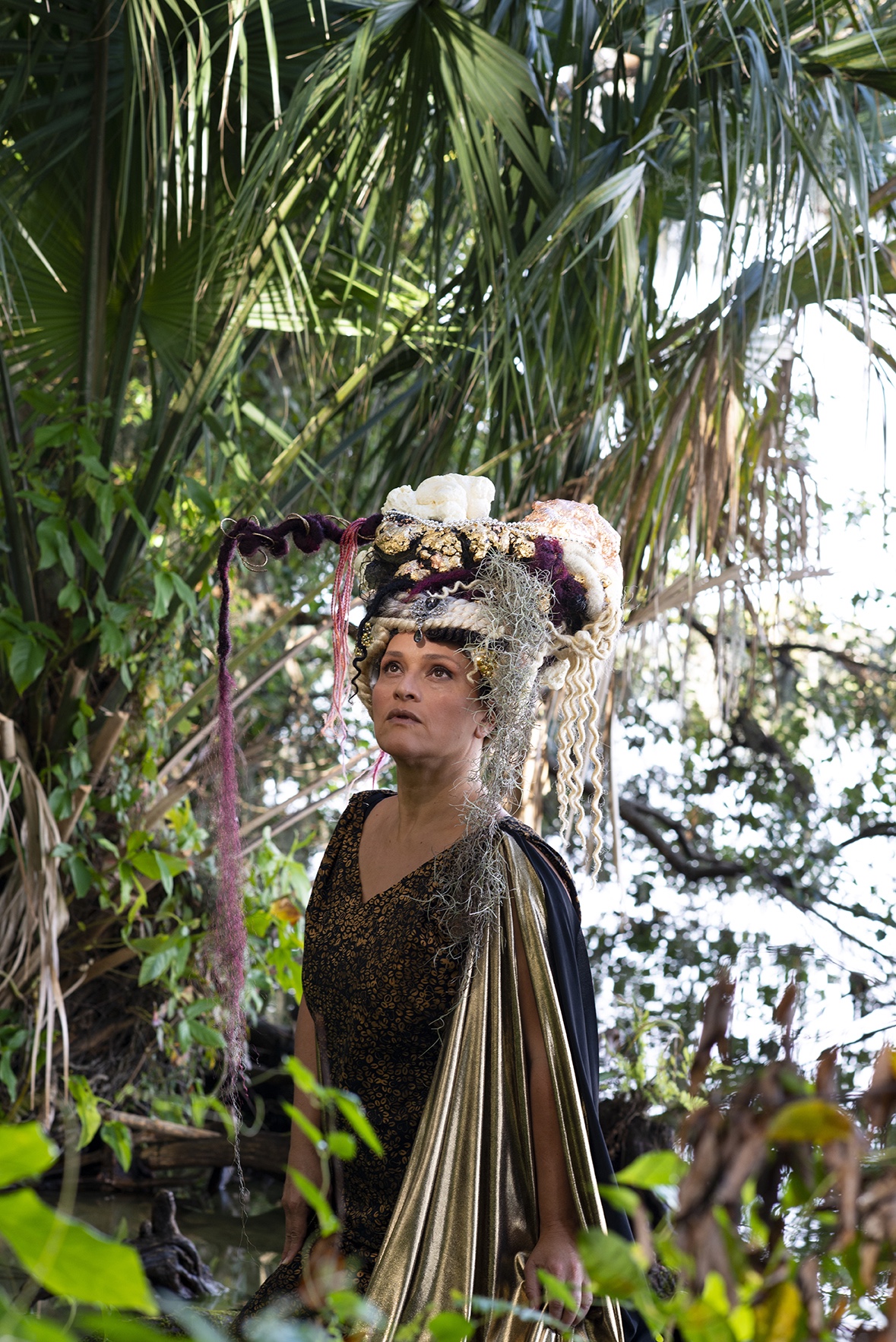 Women in garden with headdress