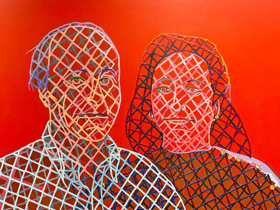 Two figures with grid-patterned faces and colorful features against an orange background.