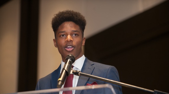 African American male giving a speech