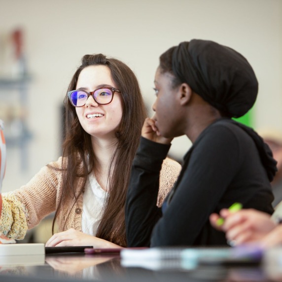 two female students in a biology class