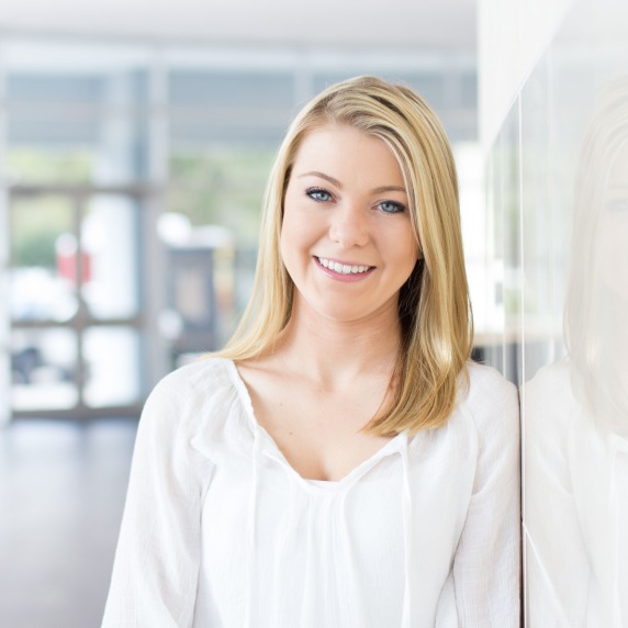close up of student leaning on wall