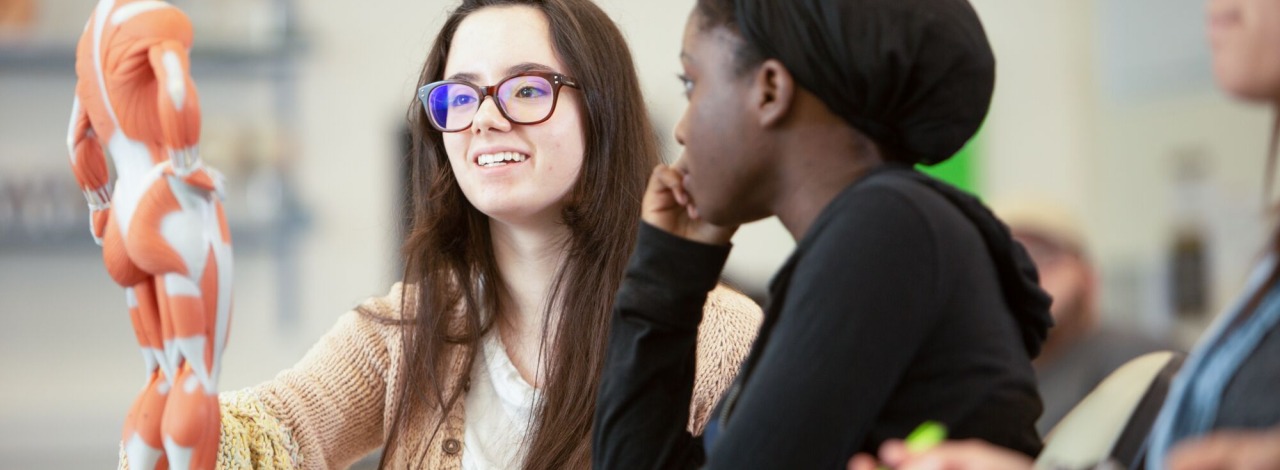 two female students in a biology class