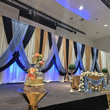 Room with stage and wedding cake